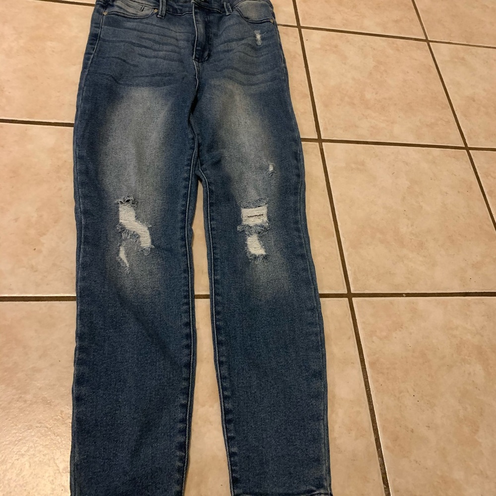 Ripped blue jeans